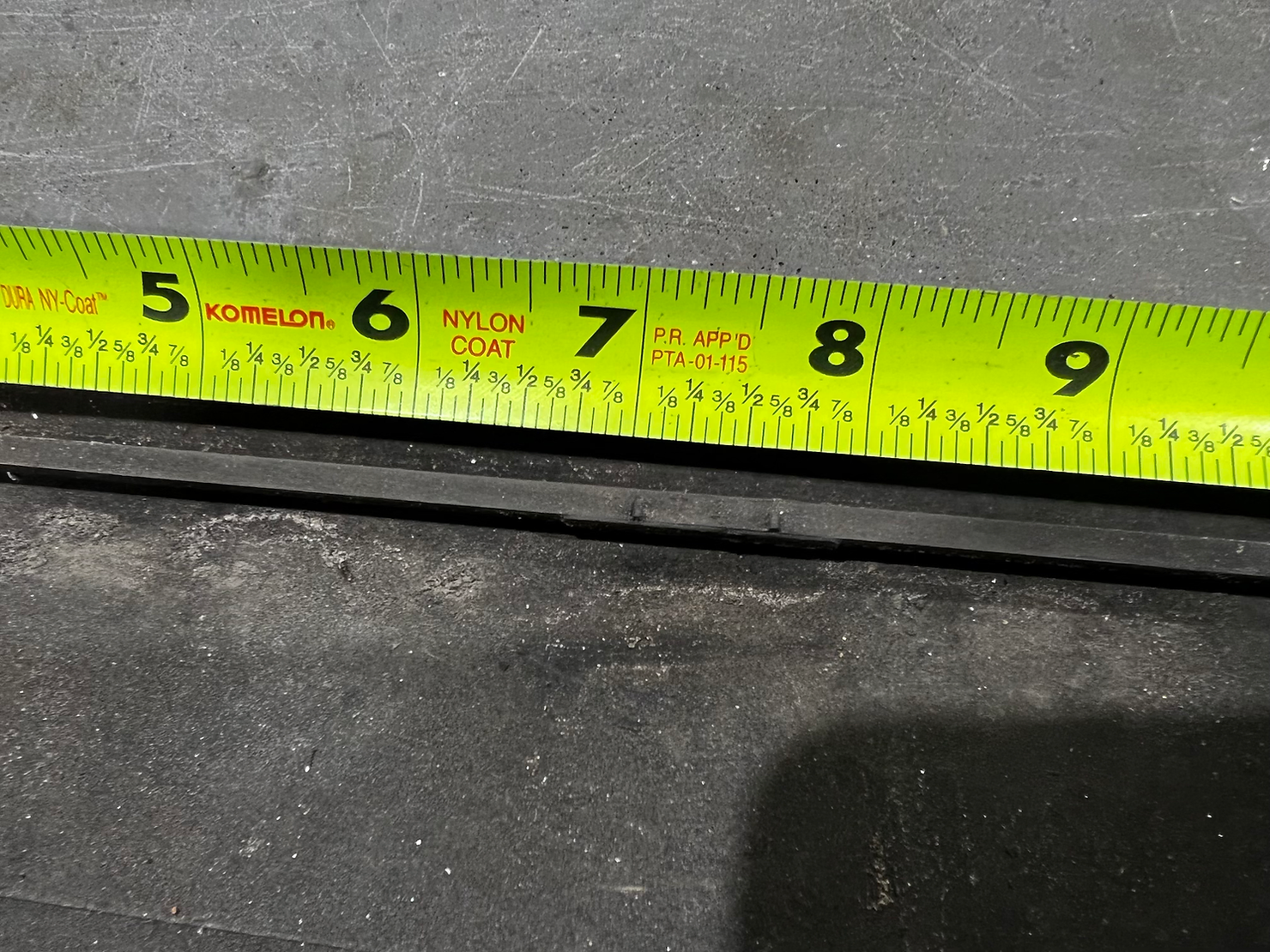 Vertical tabs where the white E36 Side Skirt clips go